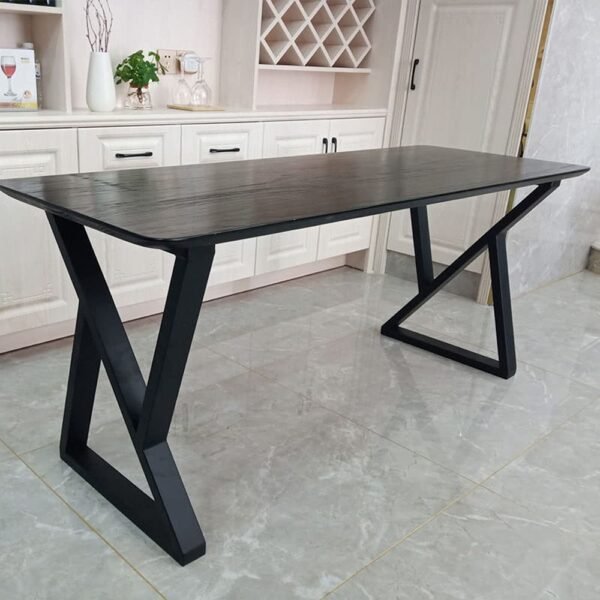 The Modern Black Wood & Metal Console Table features a bold geometric design with a sleek black wooden top, perfect for modern interiors and decorative spaces.